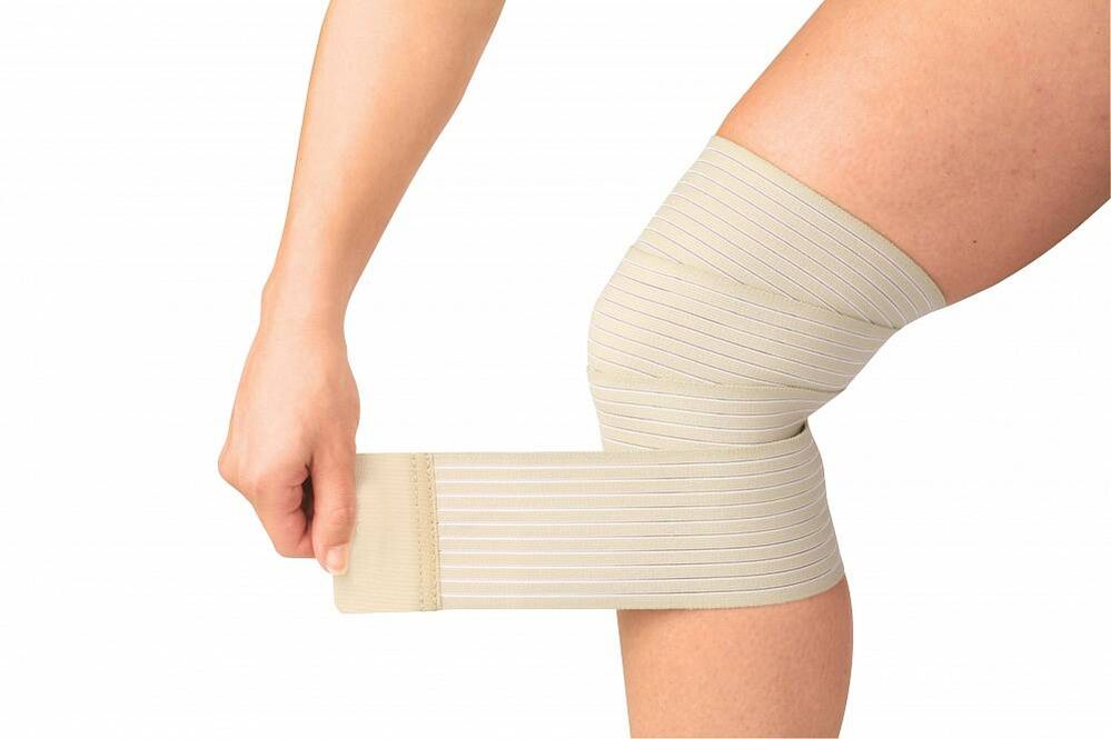 bendaggio elastico al ginocchio